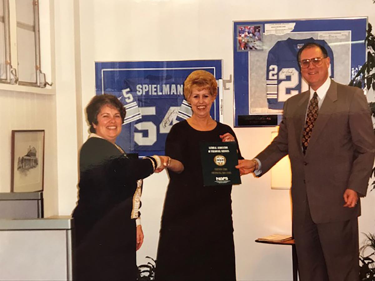 Malcolm and Peggy Richards receiving an award